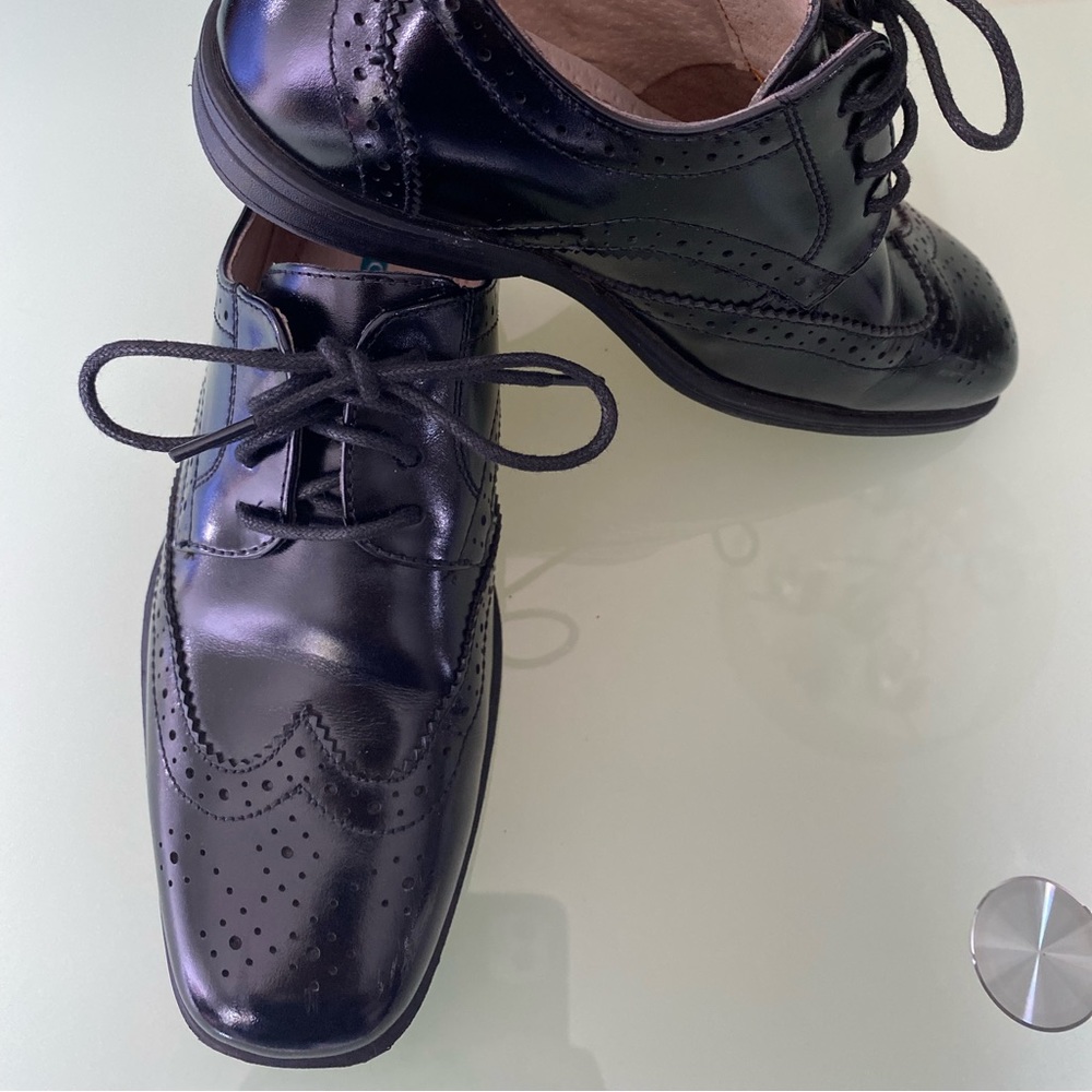 Boys Florsheim black reveal wing Jr.